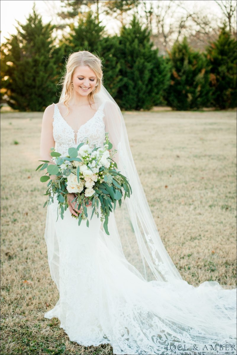 Bridal portrait with bouquet at Meadow Creek Farm in Toney Alabama